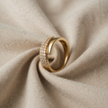 Elegant gold ring with shiny stone in open design
