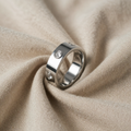 Karoline – Wide Band Ring with Heart Decoration and Crystal Stone