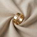 Karoline – Gold-coloured Ring with Heart Engraving and Crystal