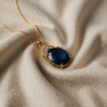Gold Blue Topaz Necklace with Handmade Charm
