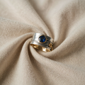 Wide Band Ring with Blue Crystal and Gold Detailing