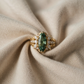 Ring with Green Navette Stone and Leaf Decoration