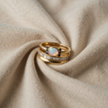 Teresa – Gold Band Ring with Oval Pastel Opal and Blue Accents