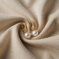 Elegant light gold pearl earrings