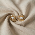Elegant, light spiral-shaped pearl earrings