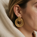 Elegant golden hollow mandala earrings
