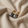 Elegant black pearl earrings with zirconia