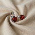 Silver earrings in ruby shape
