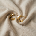 Johanna Earrings – Clear Balanced Shape with Gold Finish