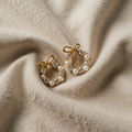 Band Pearl Circle Earrings Featuring Gleaming Cream Pearls