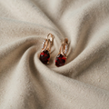 Gold Ruby Red Twisted Drop Earrings