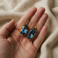 Gold Blue Flower Earrings with Deep Blue Stones in Polished Gold