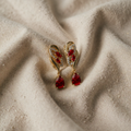 Drop-shaped earrings with golden rubies