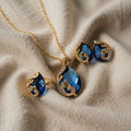 Blue Crystal Necklace with Gold Earrings on a Silver Chain