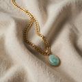 Gold Necklace with Green Cabochon Pendant