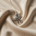 Necklace with Twisted Cross in White Gold
