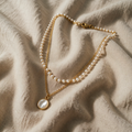 Shiny Pearl Necklace with Multi-Layered Silhouettes