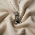 Handmade necklace with dog paw print and bone with cubic zirconia