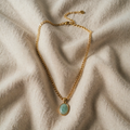 Luisa – gold-coloured Necklace with round stone pendant