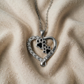 Heart-Shaped Necklace with Paw Motif in Elegant Design