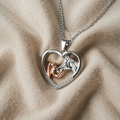 Gold Heart-Shaped Zircon Necklace Featuring Girl and Horse Design