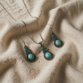 Vintage necklace with turquoise pendant and earrings in antique silver