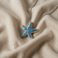 Silver watch with glowing blue star and opal