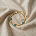 Gold-Coloured Bracelet with Three Turquoise Squares