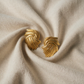 Fausta – Gold-Coloured Earrings with Leaf Texture