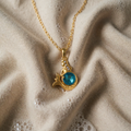 Gold Necklace with blue crystal