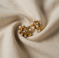 Gold-coloured earrings with crystal and pearl effect