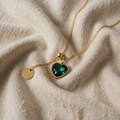 Toma – Gold-coloured Necklace with Green Heart Charm