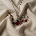White Gold Jewellery Set with Radiant Ruby Centrepiece