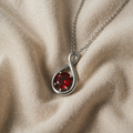 Infinity Pendant in White Gold with Ruby