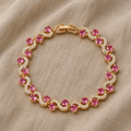 Graceful Wave Bracelet with Pink Stones